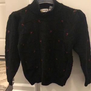 Rose appliqué black sweater